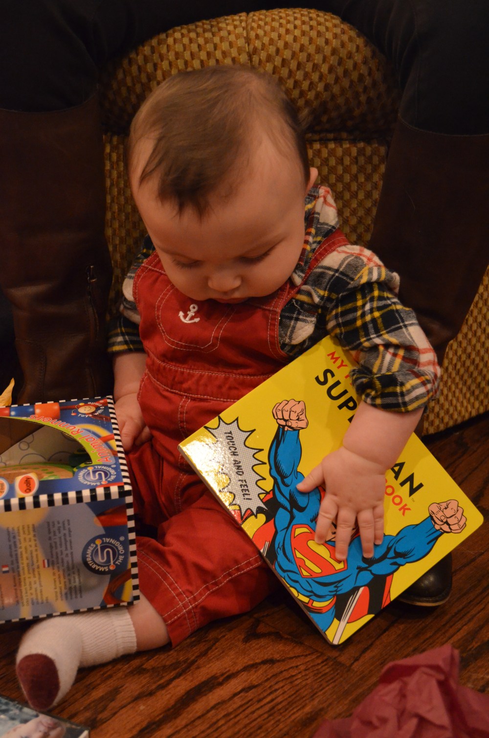 Baby Foster got his first Superman book!