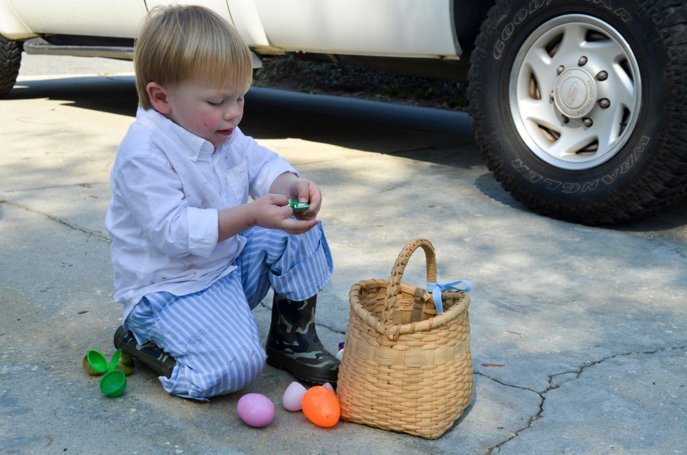 Digging in.  Yes, I let him wear his camo boots with his cute Easter outfit on Easter Sunday.
